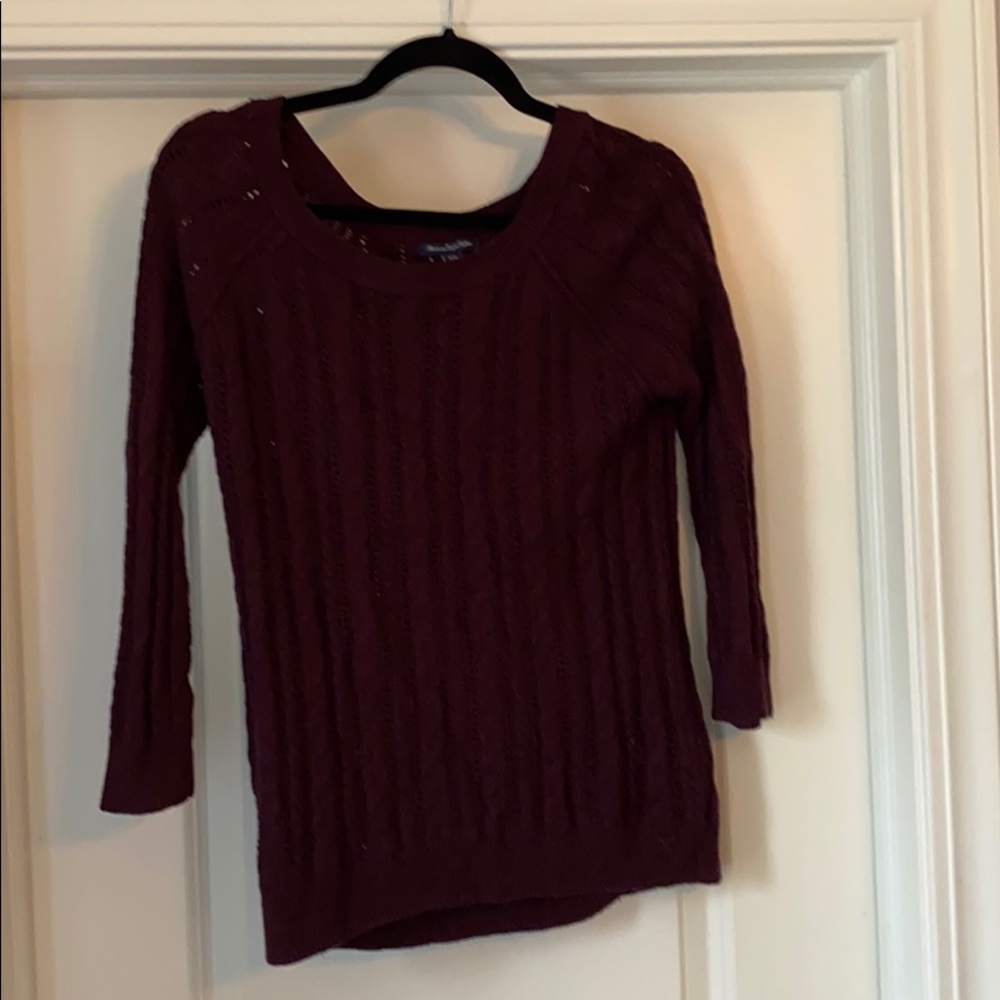 Maroon American Eagle sweater.